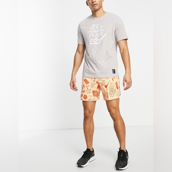 Nike Running Dri-FIT A.I.R. Nathan Bell graphic woven shorts in dusty orange - Picture 3 of 8
